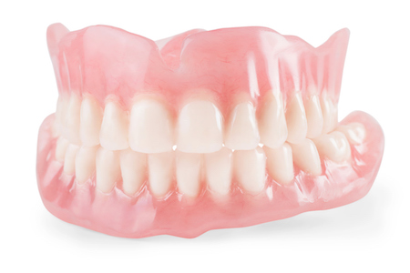 photo of upper and lower full dentures